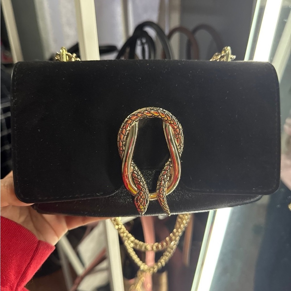 Black Designer Shoulder Bag with Gold Accents